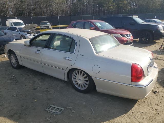 Photo 2 from auction – 2004 LINCOLN TOWN CAR U with VIN 1LNHM83W34Y614534