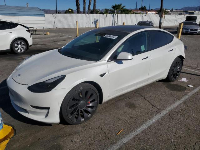 TESLA MODEL 3 2022 with VIN 5YJ3E1EC7NF112634 - Photo from auction