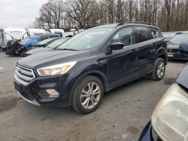 FORD ESCAPE SE 2018 with VIN 1FMCU0GD3JUA01613 - Photo from auction