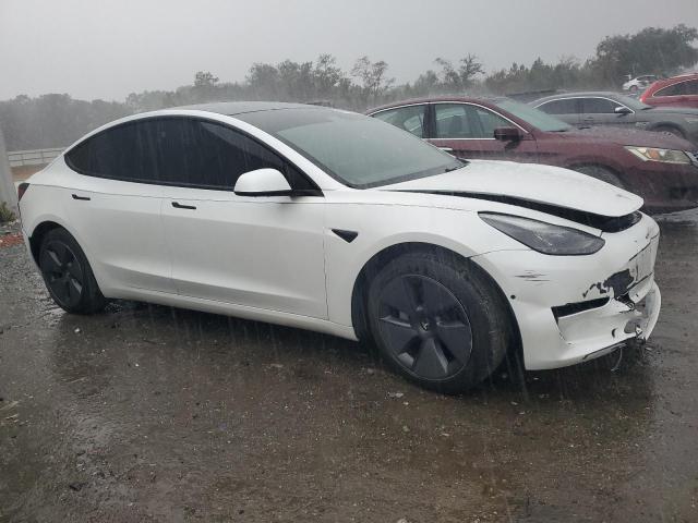 Photo 4 from auction – 2021 TESLA MODEL 3 with VIN 5YJ3E1EA9MF907911