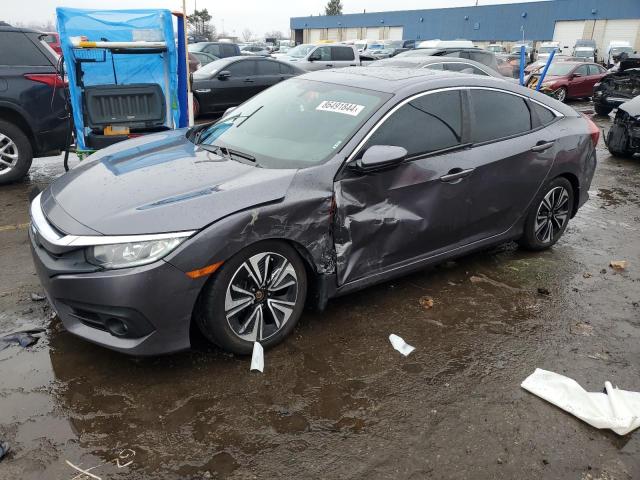 HONDA CIVIC EX 2016 with VIN 19XFC1F37GE038531 - Photo from auction