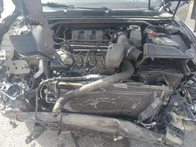 Photo 11 from auction – 2016 FORD TAURUS POL with VIN 1FAHP2MK9GG114463
