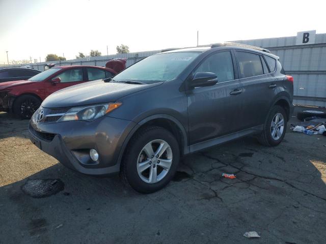 TOYOTA RAV4 XLE 2014 with VIN 2T3WFREV1EW100659 - Photo from auction