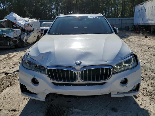 Photo 5 from auction – 2014 BMW X5 XDRIVE5 with VIN 5UXKR6C50E0C03326