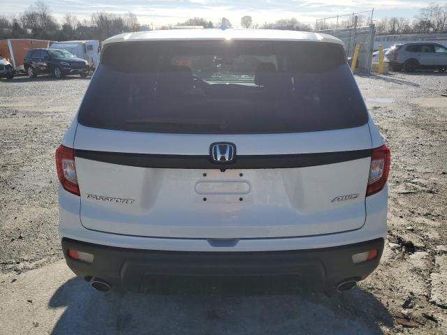 Photo 6 from auction – 2021 HONDA PASSPORT E with VIN 5FNYF8H5XMB011904