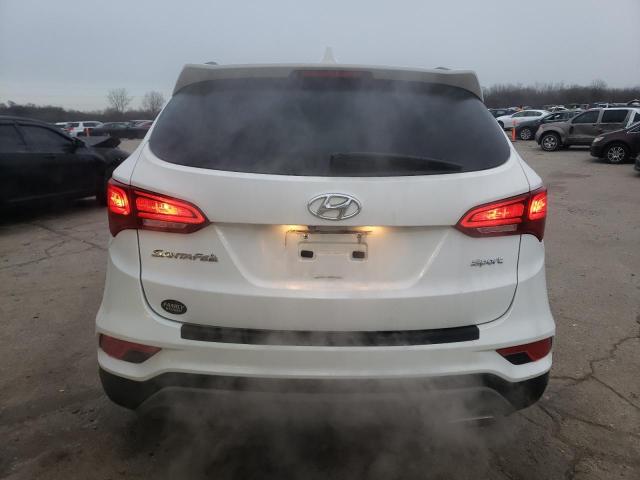 Photo 6 from auction – 2018 HYUNDAI SANTA FE S with VIN 5NMZU3LB2JH097147
