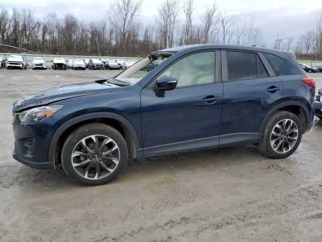 MAZDA CX-5 GT 2016 with VIN JM3KE4DY3G0672590 - Photo from auction