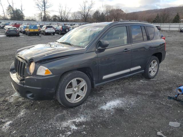 JEEP COMPASS SP 2010 with VIN 1J4NF1FB0AD675869 - Photo from auction