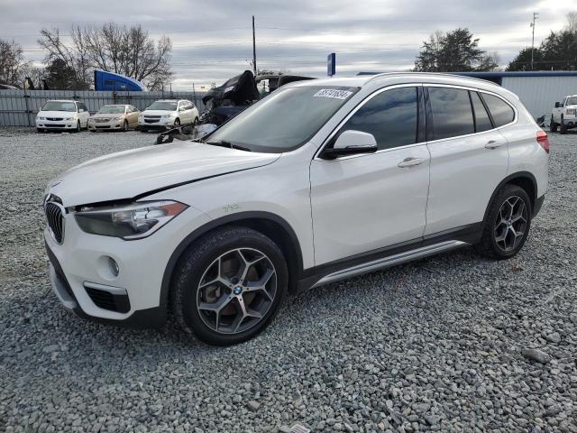 BMW X1 XDRIVE2 2018 with VIN WBXHT3C33J5L33849 - Photo from auction