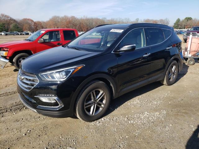 HYUNDAI SANTA FE S 2018 with VIN 5NMZU3LB2JH100256 - Photo from auction