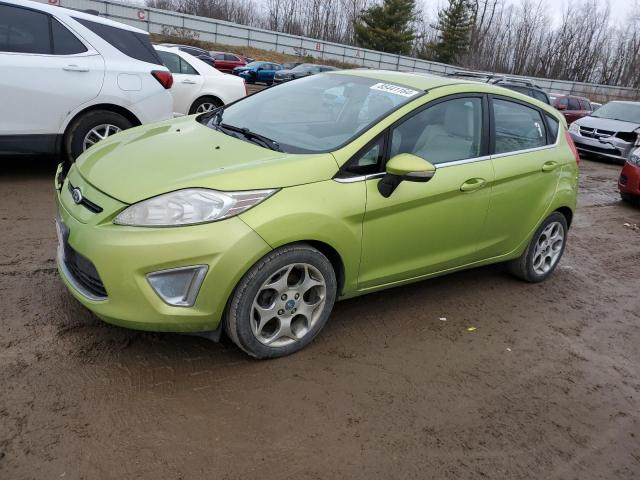 FORD FIESTA SES 2011 with VIN 3FADP4FJ6BM119133 - Photo from auction