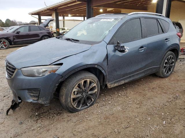 MAZDA CX-5 GT 2016 with VIN JM3KE2DY5G0667556 - Photo from auction