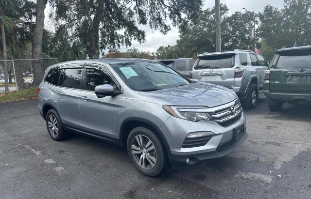 HONDA PILOT EX 2017 with VIN 5FNYF6H3XHB042479 - Photo from auction