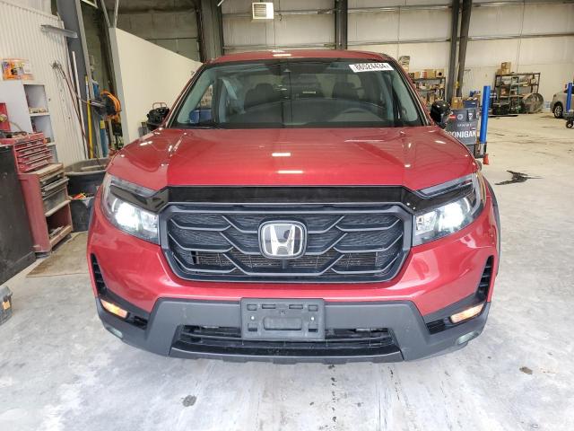 Photo 5 from auction – 2023 HONDA RIDGELINE with VIN 5FPYK3F18PB050520