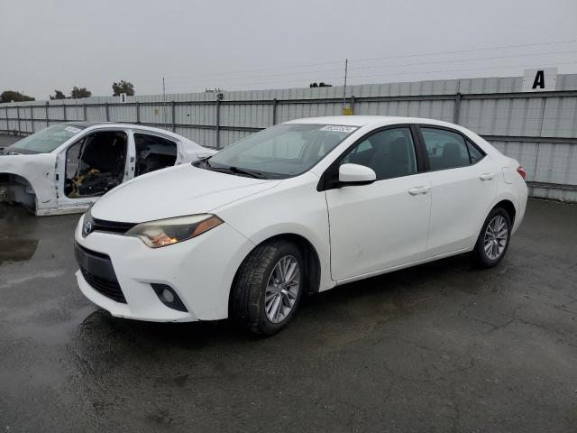 TOYOTA COROLLA L 2014 with VIN 5YFBURHE5EP150054 - Photo from auction