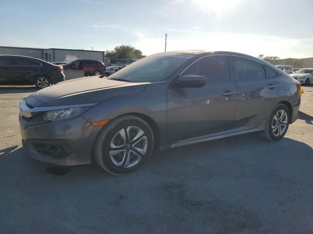 HONDA CIVIC EX 2017 with VIN 19XFC1F36HE002041 - Photo from auction