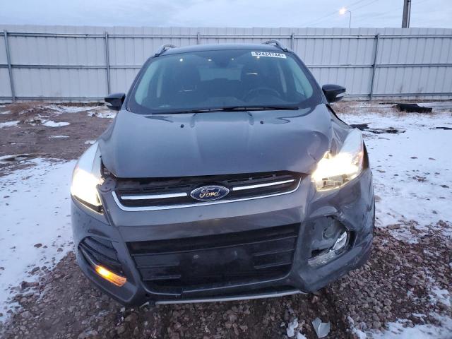 Photo 5 from auction – 2015 FORD ESCAPE TIT with VIN 1FMCU9J92FUC26203