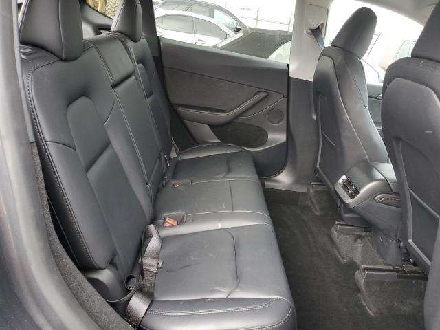Photo 11 from auction – 2023 TESLA MODEL Y with VIN 7SAYGDEE9PF911310