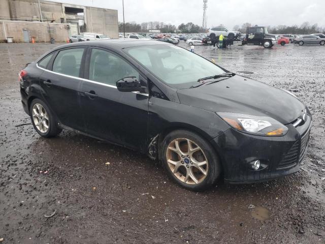 Photo 4 from auction – 2013 FORD FOCUS TITA with VIN 1FADP3J2XDL255019