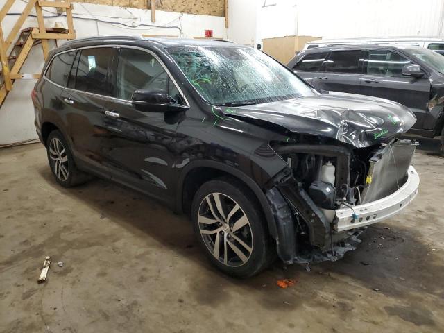 Photo 4 from auction – 2018 HONDA PILOT ELIT with VIN 5FNYF6H06JB057282