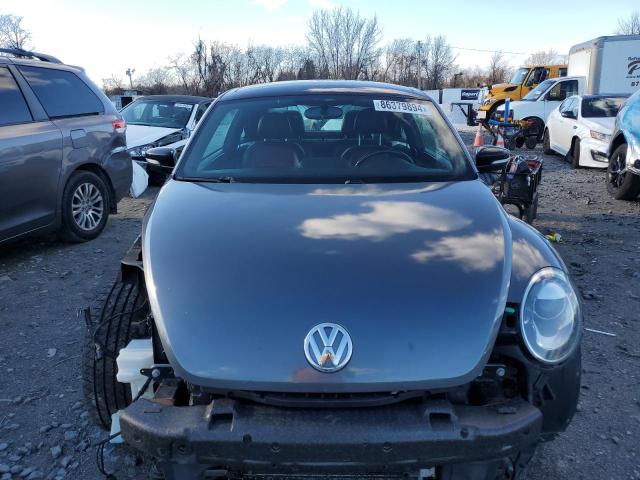 Photo 5 from auction – 2012 VOLKSWAGEN BEETLE TUR with VIN 3VWVA7AT9CM663246