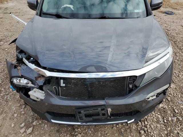 Photo 12 from auction – 2017 HONDA PILOT ELIT with VIN 5FNYF6H04HB098245