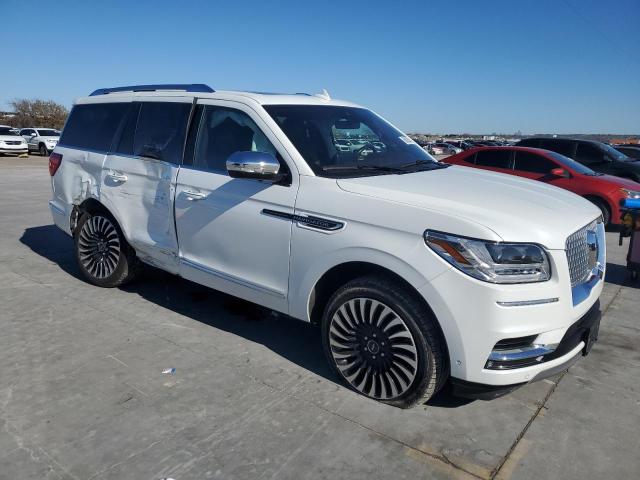 Photo 4 from auction – 2021 LINCOLN NAVIGATOR with VIN 5LMJJ2TTXMEL04554
