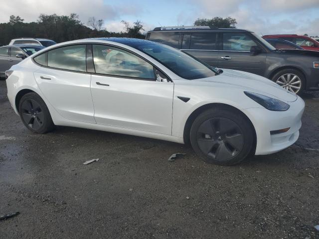 Photo 4 from auction – 2023 TESLA MODEL 3 with VIN 5YJ3E1EA1PF640896