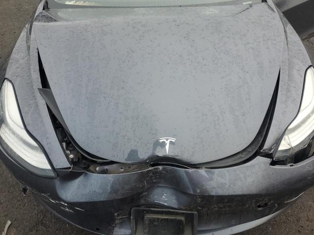 Photo 11 from auction – 2018 TESLA MODEL 3 with VIN 5YJ3E1EA4JF117959