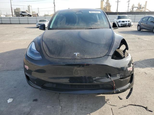 Photo 5 from auction – 2023 TESLA MODEL Y with VIN 7SAYGDEE1PF881834