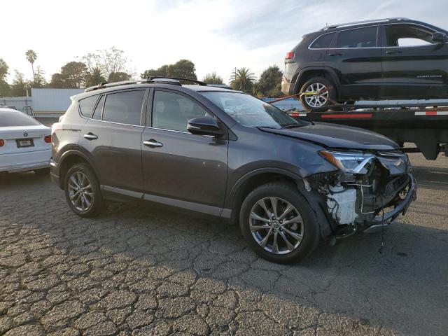Photo 4 from auction – 2018 TOYOTA RAV4 LIMIT with VIN JTMDFREV6JJ233594