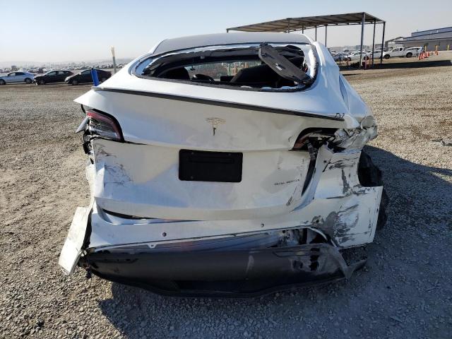 Photo 6 from auction – 2022 TESLA MODEL Y with VIN 7SAYGDEE7NF576402
