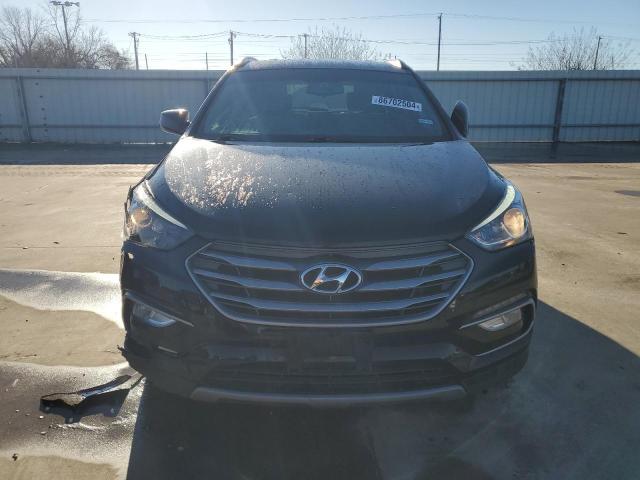 Photo 5 from auction – 2017 HYUNDAI SANTA FE S with VIN 5NMZU3LB2HH027397