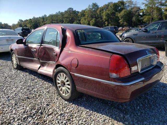 Photo 2 from auction – 2004 LINCOLN TOWN CAR E with VIN 1LNHM81W94Y660484