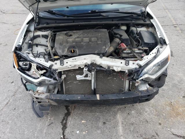 Photo 11 from auction – 2014 TOYOTA COROLLA L with VIN 5YFBURHE0EP098073