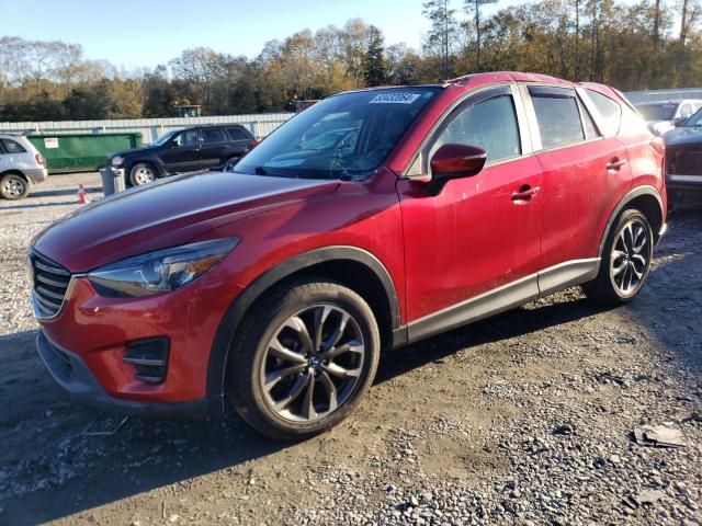 MAZDA CX-5 GT 2016 with VIN JM3KE4DY0G0909584 - Photo from auction