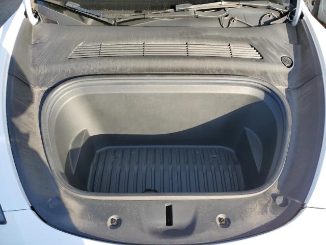 Photo 11 from auction – 2021 TESLA MODEL Y with VIN 5YJYGAEE4MF238191