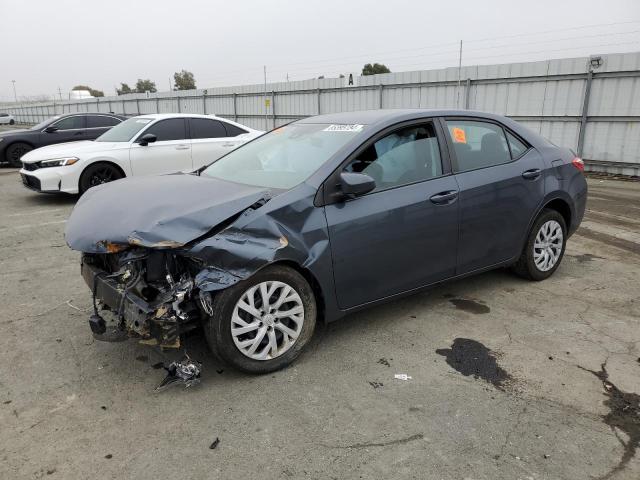 TOYOTA COROLLA L 2019 with VIN 5YFBURHEXKP856738 - Photo from auction