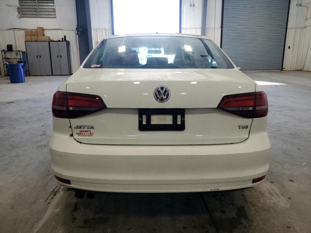 Photo 6 from auction – 2018 VOLKSWAGEN JETTA S with VIN 3VW2B7AJ3JM252906