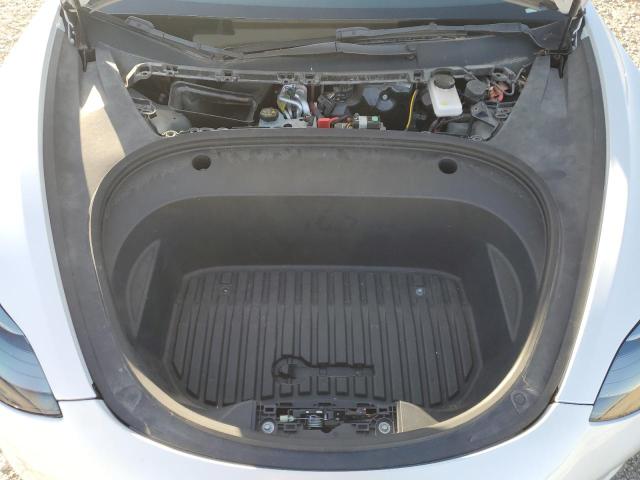 Photo 11 from auction – 2022 TESLA MODEL 3 with VIN 5YJ3E1EC6NF293399