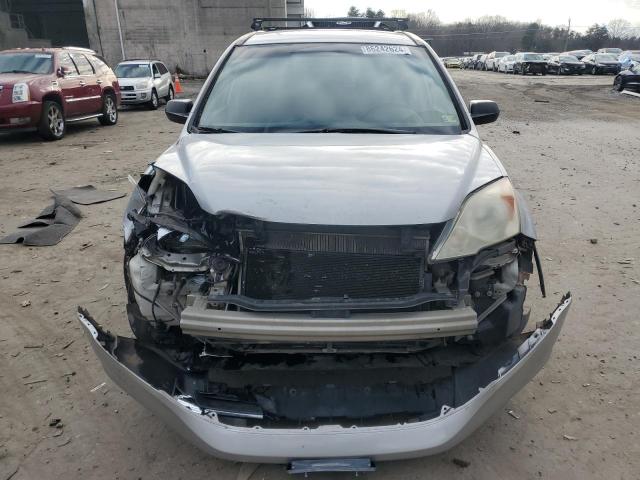 Photo 5 from auction – 2011 HONDA CR-V LX with VIN 5J6RE3H39BL026472