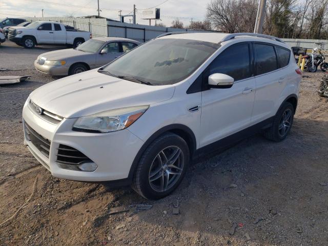FORD ESCAPE TIT 2014 with VIN 1FMCU0JX7EUB84720 - Photo from auction