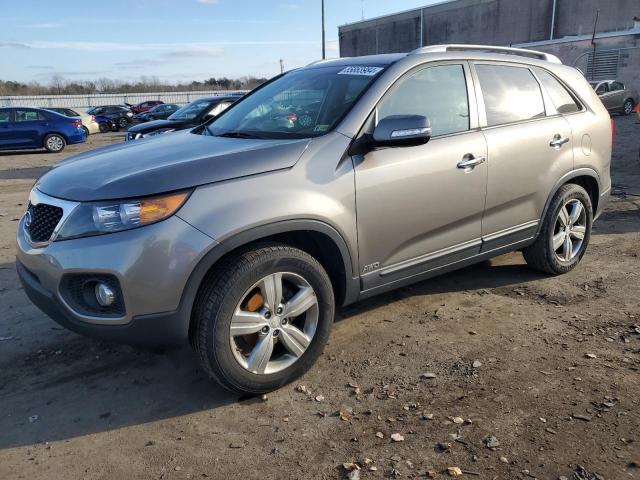 KIA SORENTO 2013 with VIN 5XYKUDA63DG371371 - Photo from auction