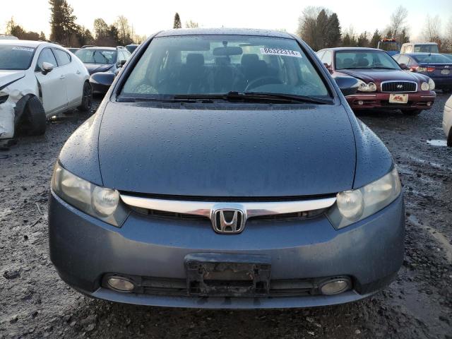 Photo 5 from auction – 2006 HONDA CIVIC HYBR with VIN JHMFA36236S024662