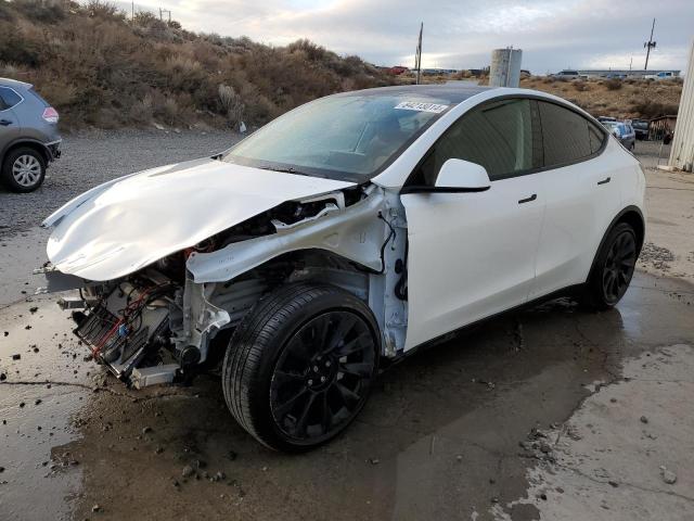 TESLA MODEL Y 2022 con VIN 7SAYGAEE0NF568396 - Foto de la subasta