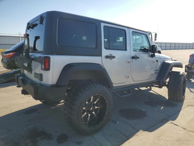 Photo 3 from auction – 2011 JEEP WRANGLER U with VIN 1J4BA3H10BL590233