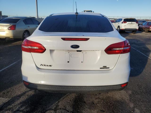 Photo 6 from auction – 2016 FORD FOCUS SE with VIN 1FADP3F23GL320354