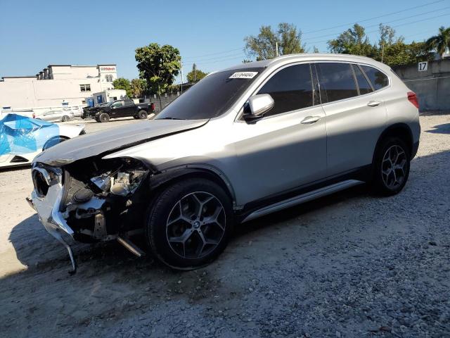 BMW X1 SDRIVE2 2018 with VIN WBXHU7C35J3F04295 - Photo from auction