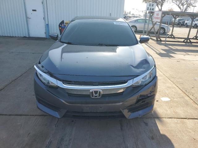 Photo 5 from auction – 2017 HONDA CIVIC LX with VIN 2HGFC2F58HH546084