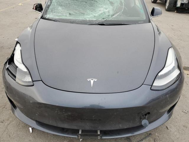 Photo 11 from auction – 2019 TESLA MODEL 3 with VIN 5YJ3E1EB1KF231198